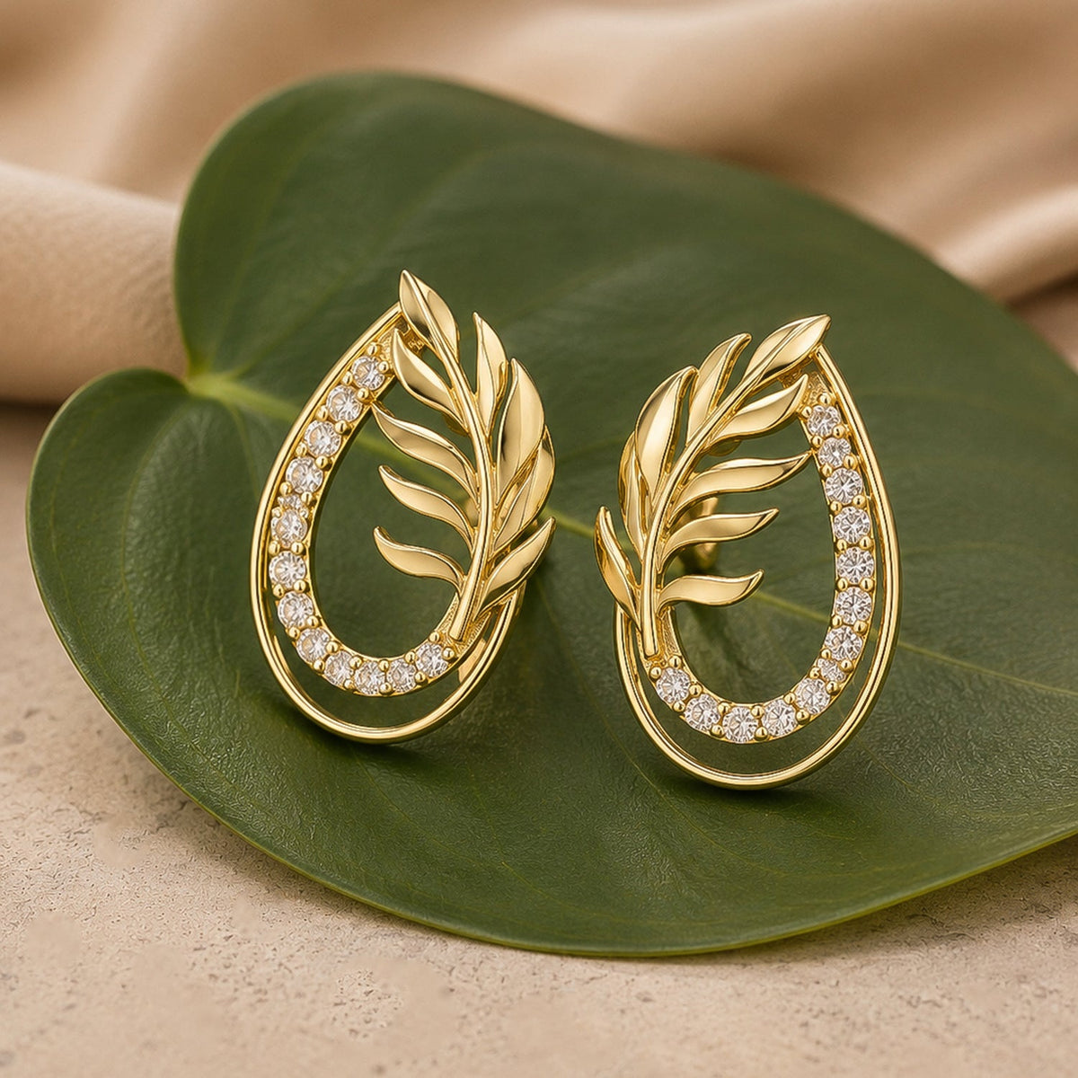 YADEEP Golden Leaf Glow Stud Earrings